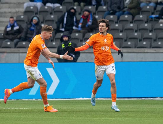 Fussball, Herren, Saison 2025 2026, 2. Bundesliga (20. Spieltag), Hertha BSC - SV Darmstadt 98, v.l. Matej Maglica (Darmstadt), Fraser Hornby (Darmstadt), Jubel nach Tor zum 2:2, 01.02. 2026,