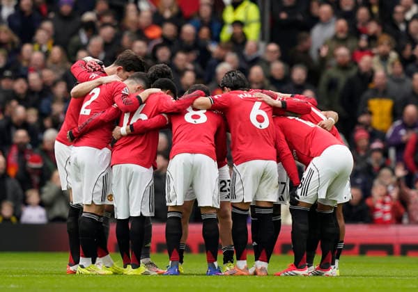 Manchester, England, 1st February 2026. Manchester United, ManU team huddle before kick off during the Manchester United vs Fulham Premier League match at Old Trafford, Manchester. Picture credit should read: Andrew Yates Sportimage EDITORIAL USE ONLY. No use with unauthorised audio, video, data, fixture lists, club league logos or live services. Online in-match use limited to 120 images, no video emulation. No use in betting, games or single club league player publications. SPI_033_AY_MAN_UTD_FULHAM SPI-4502-0032