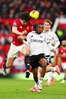 Harry Maguire of Manchester United, ManU and Samuel Chukwueze of Fulham Manchester United v Fulham, Premier League, Football, Old Trafford, Manchester, UK - 01 Feb 2026Manchester Old Trafford United Kingdom EDITORIAL USE ONLY No use with unauthorised audio, video, data, fixture lists, club league logos or live services. Online in-match use limited to 120 images, no video emulation. No use in betting, games or single club league player publications. Copyright: xPaulxCurrie Shutterstockx 16496861ei