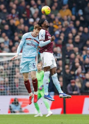 Birmingham, England, 1st February 2026. Sepp van den Berg of Brentford and Tammy Abraham of Aston Villa battle for the ball during the Aston Villa vs Brentford Premier League match at Villa Park, Birmingham. Picture credit should read: Cody Froggatt Sportimage EDITORIAL USE ONLY. No use with unauthorised audio, video, data, fixture lists, club league logos or live services. Online in-match use limited to 120 images, no video emulation. No use in betting, games or single club league player publications. SPI_016_CF_ASTON_VILLA_V_BRENTFORD SPI-4503-0016