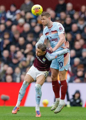 Birmingham, England, 1st February 2026. Kristoffer Ajer of Brentford heads the ball while battling with Matty Cash of Aston Villa during the Aston Villa vs Brentford Premier League match at Villa Park, Birmingham. Picture credit should read: Cody Froggatt Sportimage EDITORIAL USE ONLY. No use with unauthorised audio, video, data, fixture lists, club league logos or live services. Online in-match use limited to 120 images, no video emulation. No use in betting, games or single club league player publications. SPI_022_CF_ASTON_VILLA_V_BRENTFORD SPI-4503-0022