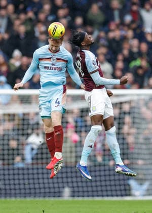 Birmingham, England, 1st February 2026. Sepp van den Berg of Brentford heads the ball while battling with Tammy Abraham of Aston Villa during the Aston Villa vs Brentford Premier League match at Villa Park, Birmingham. Picture credit should read: Cody Froggatt Sportimage EDITORIAL USE ONLY. No use with unauthorised audio, video, data, fixture lists, club league logos or live services. Online in-match use limited to 120 images, no video emulation. No use in betting, games or single club league player publications. SPI_024_CF_ASTON_VILLA_V_BRENTFORD SPI-4503-0023