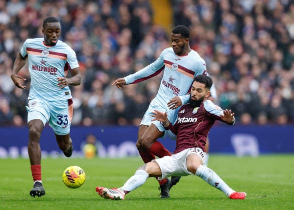 Birmingham, England, 1st February 2026. Douglas Luiz of Aston Villa tackles Dango Ouattara of Brentford during the Aston Villa vs Brentford Premier League match at Villa Park, Birmingham. Picture credit should read: Cody Froggatt Sportimage EDITORIAL USE ONLY. No use with unauthorised audio, video, data, fixture lists, club league logos or live services. Online in-match use limited to 120 images, no video emulation. No use in betting, games or single club league player publications. SPI_023_CF_ASTON_VILLA_V_BRENTFORD SPI-4503-0024