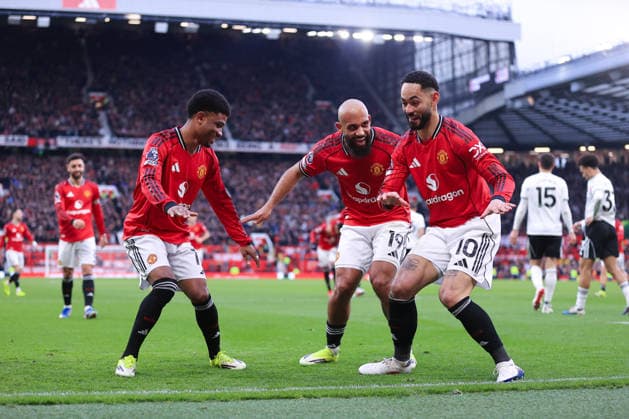 Football - Premier League - Manchester United, ManU v Fulham 1st February 2026 - Premier League - Manchester United v Fulham - Matheus Cunha of Manchester United celebrates with Bryan Mbeumo of Manchester United (C) and Amad Diallo of Manchester United after scoring their 2nd goal - Photo: Simon Stacpoole Offside. Manchester UK Copyright: xSimonxStacpoolexOffside