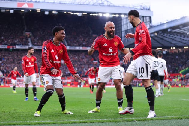 Football - Premier League - Manchester United, ManU v Fulham 1st February 2026 - Premier League - Manchester United v Fulham - Matheus Cunha of Manchester United celebrates with Bryan Mbeumo of Manchester United (C) and Amad Diallo of Manchester United after scoring their 2nd goal - Photo: Simon Stacpoole Offside. Manchester UK Copyright: xSimonxStacpoolexOffside