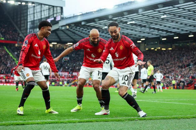 Manchester United, ManU v Fulham, Premier League Manchester United forward Matheus Cunha (10) scores a GOAL 2-0 and celebrates Manchester United forward Bryan Mbeumo (19) Manchester United midfielder Amad Diallo (16) during the Manchester United v Fulham Premier League match at Old Trafford, Manchester, England on 1 February 2026 Credit: Phil Duncan Every Second Media Editorial use only. All images are copyright Every Second Media Limited. No images may be reproduced without prior permission. All rights reserved. Premier League and Football League images are subject to licensing agreements with Football DataCo Limited. see https: www.football-dataco.com Copyright: xIMAGO EveryxSecondxMediax ESM-1779-0007 PhilxDuncanx xEveryxSecondxMediax