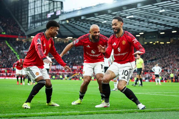 Manchester United, ManU v Fulham, Premier League Manchester United forward Matheus Cunha (10) scores a GOAL 2-0 and celebrates Manchester United forward Bryan Mbeumo (19) Manchester United midfielder Amad Diallo (16) during the Manchester United v Fulham Premier League match at Old Trafford, Manchester, England on 1 February 2026 Credit: Phil Duncan Every Second Media Editorial use only. All images are copyright Every Second Media Limited. No images may be reproduced without prior permission. All rights reserved. Premier League and Football League images are subject to licensing agreements with Football DataCo Limited. see https: www.football-dataco.com Copyright: xIMAGO EveryxSecondxMediax ESM-1779-0008 PhilxDuncanx xEveryxSecondxMediax