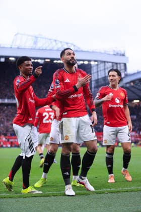 Football - Premier League - Manchester United, ManU v Fulham 1st February 2026 - Premier League - Manchester United v Fulham - Matheus Cunha of Manchester United (C) celebrates with Amad Diallo of Manchester United (L) and Lisandro Martinez of Manchester United (R) after scoring their 2nd goal - Photo: Simon Stacpoole Offside. Manchester UK Copyright: xSimonxStacpoolexOffside