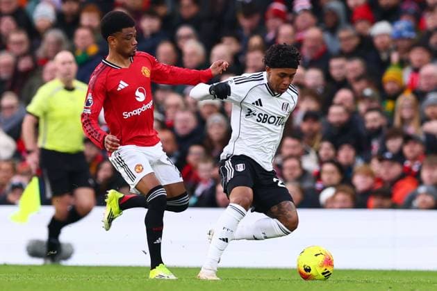 Kevin of Fulham and Amad Diallo of Manchester United, ManU Manchester United v Fulham, Premier League, Football, Old Trafford, Manchester, UK - 01 Feb 2026Manchester Old Trafford United Kingdom EDITORIAL USE ONLY No use with unauthorised audio, video, data, fixture lists, club league logos or live services. Online in-match use limited to 120 images, no video emulation. No use in betting, games or single club league player publications.  Copyright: xPaulxCurrie Shutterstockx 16496861ga