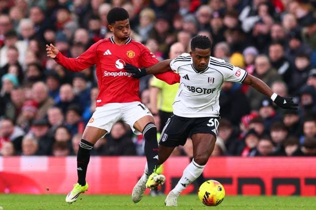 Ryan Sessegnon of Fulham and Amad Diallo of Manchester United, ManU Manchester United v Fulham, Premier League, Football, Old Trafford, Manchester, UK - 01 Feb 2026Manchester Old Trafford United Kingdom EDITORIAL USE ONLY No use with unauthorised audio, video, data, fixture lists, club league logos or live services. Online in-match use limited to 120 images, no video emulation. No use in betting, games or single club league player publications.  Copyright: xPaulxCurrie Shutterstockx 16496861gc