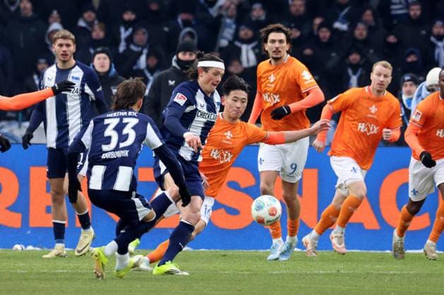 DEU, DFL, 2. FBL, Hertha BSC vs. Darmstadt, 01.02.2026, Berliner Olympiastadion, Berlin, DEU, DFL, 2. FBL, Hertha BSC vs. Darmstadt, im Bild Fabian Reese (Hertha BSC Berlin 11), Michal Karbownik (Hertha BSC Berlin 33), HIROKI AKIYAMA (Darmstadt 16), Fraser Hornby (Darmstadt 9) DFL - regulations prohibit any use of Photographs as image sequences and or quasi-video