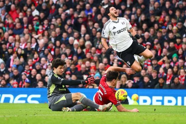 Raul Jimenez of Fulham is fouled by Harry Maguire of Manchester United, ManU for a penalty Manchester United v Fulham, Premier League, Football, Old Trafford, Manchester, UK - 01 Feb 2026Manchester Old Trafford United Kingdom EDITORIAL USE ONLY No use with unauthorised audio, video, data, fixture lists, club league logos or live services. Online in-match use limited to 120 images, no video emulation. No use in betting, games or single club league player publications.  Copyright: xPaulxCurrie Shutterstockx 16496861gn