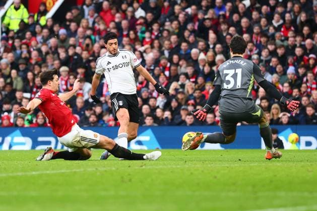 Raul Jimenez of Fulham is fouled by Harry Maguire of Manchester United, ManU for a penalty Manchester United v Fulham, Premier League, Football, Old Trafford, Manchester, UK - 01 Feb 2026Manchester Old Trafford United Kingdom EDITORIAL USE ONLY No use with unauthorised audio, video, data, fixture lists, club league logos or live services. Online in-match use limited to 120 images, no video emulation. No use in betting, games or single club league player publications.  Copyright: xPaulxCurrie Shutterstockx 16496861gp