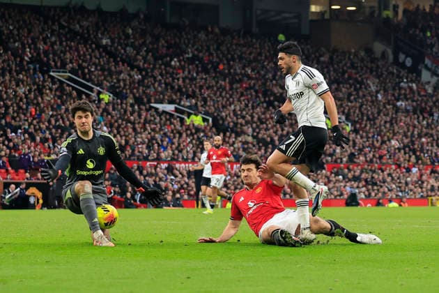 Manchester United, ManU v Fulham, Premier League Harry Maguire (5) of Manchester United fouls Raul Jimenez (7) of Fulham and a penalty is given during the Premier League match between Manchester United and Fulham at Old Trafford, Manchester, UK on 1 February 2026. Manchester Old Trafford Greater Manchester UK Editorial use only DataCo restrictions apply See www.football-dataco.com , Copyright: xConorxMolloyx PSI-23668-0082