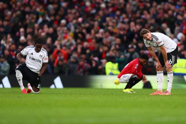 Sander Berge of Fulham at the end of the match and Calvin Bassey Manchester United, ManU v Fulham, Premier League, Football, Old Trafford, Manchester, UK - 01 Feb 2026Manchester Old Trafford United Kingdom EDITORIAL USE ONLY No use with unauthorised audio, video, data, fixture lists, club league logos or live services. Online in-match use limited to 120 images, no video emulation. No use in betting, games or single club league player publications. Copyright: xPaulxCurrie Shutterstockx 16496861hv
