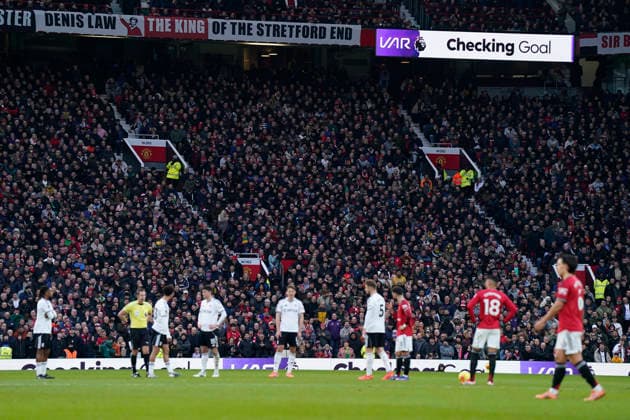 Manchester, England, 1st February 2026. Players wait for a var decision during the Manchester United, ManU vs Fulham Premier League match at Old Trafford, Manchester. Picture credit should read: Andrew Yates Sportimage EDITORIAL USE ONLY. No use with unauthorised audio, video, data, fixture lists, club league logos or live services. Online in-match use limited to 120 images, no video emulation. No use in betting, games or single club league player publications. SPI_045_AY_MAN_UTD_FULHAM SPI-4502-0044
