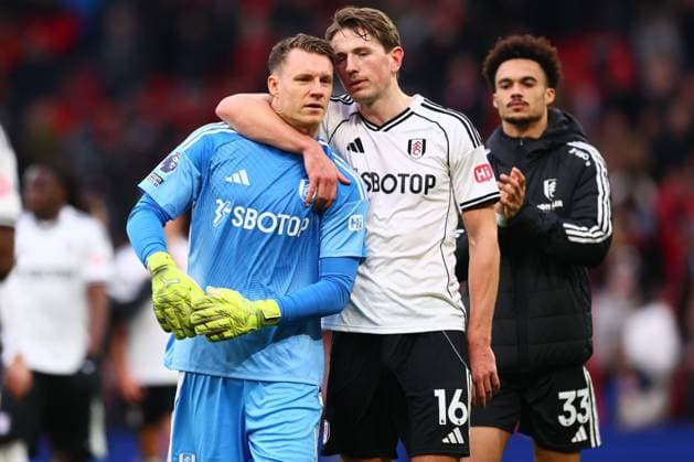 Bernd Leno of Fulham and Sander Berge at the end of the match Manchester United, ManU v Fulham, Premier League, Football, Old Trafford, Manchester, UK - 01 Feb 2026Manchester Old Trafford United Kingdom EDITORIAL USE ONLY No use with unauthorised audio, video, data, fixture lists, club league logos or live services. Online in-match use limited to 120 images, no video emulation. No use in betting, games or single club league player publications. Copyright: xPaulxCurrie Shutterstockx 16496861ja