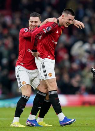 Manchester, England, 1st February 2026. Benjamin Sesko of Manchester United, ManU (R) reacts at the final whistle with Diogo Dalot of Manchester United after scoring the winning goal during the Manchester United vs Fulham Premier League match at Old Trafford, Manchester. Picture credit should read: Andrew Yates Sportimage EDITORIAL USE ONLY. No use with unauthorised audio, video, data, fixture lists, club league logos or live services. Online in-match use limited to 120 images, no video emulation. No use in betting, games or single club league player publications. SPI_048_AY_MAN_UTD_FULHAM SPI-4502-0047