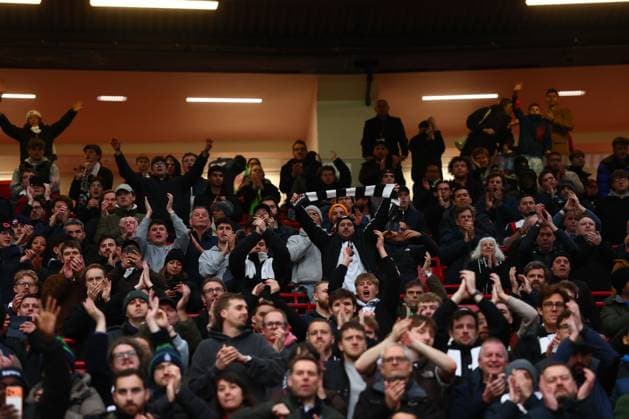 Fulham fans at the end of the match Manchester United, ManU v Fulham, Premier League, Football, Old Trafford, Manchester, UK - 01 Feb 2026Manchester Old Trafford United Kingdom EDITORIAL USE ONLY No use with unauthorised audio, video, data, fixture lists, club league logos or live services. Online in-match use limited to 120 images, no video emulation. No use in betting, games or single club league player publications. Copyright: xPaulxCurrie Shutterstockx 16496861jd