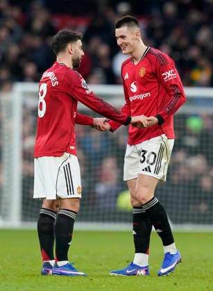 Manchester, England, 1st February 2026. Benjamin Sesko of Manchester United, ManU (R) reacts at the final whistle with Bruno Fernandes of Manchester United after scoring the winning goal during the Manchester United vs Fulham Premier League match at Old Trafford, Manchester. Picture credit should read: Andrew Yates Sportimage EDITORIAL USE ONLY. No use with unauthorised audio, video, data, fixture lists, club league logos or live services. Online in-match use limited to 120 images, no video emulation. No use in betting, games or single club league player publications. SPI_050_AY_MAN_UTD_FULHAM SPI-4502-0049