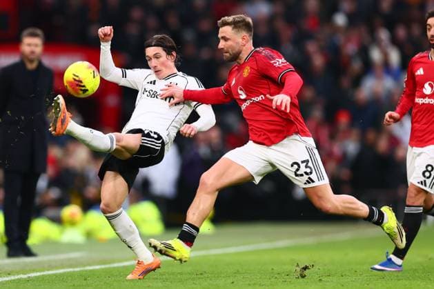 Harry Wilson of Fulham and Luke Shaw of Manchester United, ManU Manchester United v Fulham, Premier League, Football, Old Trafford, Manchester, UK - 01 Feb 2026Manchester Old Trafford United Kingdom EDITORIAL USE ONLY No use with unauthorised audio, video, data, fixture lists, club league logos or live services. Online in-match use limited to 120 images, no video emulation. No use in betting, games or single club league player publications. Copyright: xPaulxCurrie Shutterstockx 16496861jl