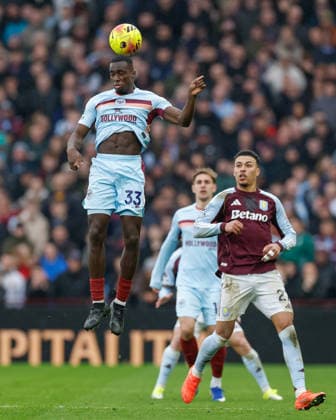 Birmingham, England, 1st February 2026. Michael Kayode of Brentford heads the ball during the Aston Villa vs Brentford Premier League match at Villa Park, Birmingham. Picture credit should read: Cody Froggatt Sportimage EDITORIAL USE ONLY. No use with unauthorised audio, video, data, fixture lists, club league logos or live services. Online in-match use limited to 120 images, no video emulation. No use in betting, games or single club league player publications. SPI_042_CF_ASTON_VILLA_V_BRENTFORD SPI-4503-0042