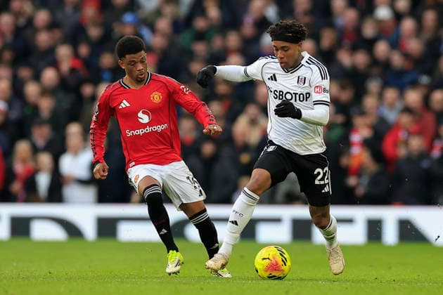 Manchester United, ManU v Fulham, Premier League Kevin (22) of Fulham and Amad Diallo (16) of Manchester United challenge for the ball during the Premier League match between Manchester United and Fulham at Old Trafford, Manchester, UK on 1 February 2026. Manchester Old Trafford Greater Manchester UK Editorial use only DataCo restrictions apply See www.football-dataco.com , Copyright: xConorxMolloyx PSI-23668-0128