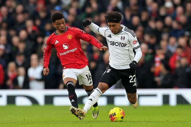 Manchester United, ManU v Fulham, Premier League Kevin (22) of Fulham and Amad Diallo (16) of Manchester United challenge for the ball during the Premier League match between Manchester United and Fulham at Old Trafford, Manchester, UK on 1 February 2026. Manchester Old Trafford Greater Manchester UK Editorial use only DataCo restrictions apply See www.football-dataco.com , Copyright: xConorxMolloyx PSI-23668-0129