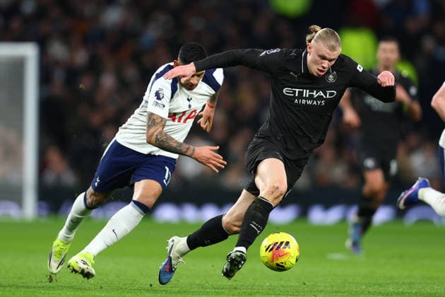 London, England, 1st February 2026. Erling Haaland of Manchester City and Cristian Romero of Tottenham Hotspur challenge for the ball during the Tottenham Hotspur vs Manchester City Premier League match at the Tottenham Hotspur Stadium, London. Picture credit should read: Paul Terry Sportimage EDITORIAL USE ONLY. No use with unauthorised audio, video, data, fixture lists, club league logos or live services. Online in-match use limited to 120 images, no video emulation. No use in betting, games or single club league player publications. SPI_033_PT_Tottenham_Man_City SPI-4504-0033
