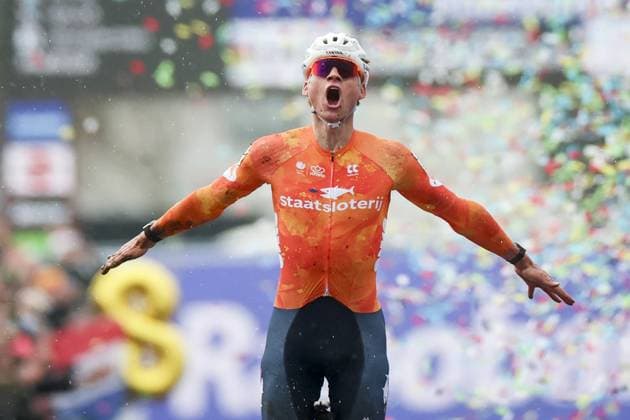 HULST - Cyclist Mathieu van der Poel celebrates his victory at the Cyclocross World Championships in Hulst, Zeeland. IRIS VAN DEN BROEK ANP xVIxANPxSportx xxANPxIVx 549345685 originalFilename: 549345685.jpg