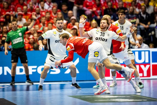 HERNING, DENMARK - FEBRUARY 1: Foul from Tom Kiesler (Germany, 30) at Mathias Gidsel (Denmark, 19) during the EHF EURO 2026 Final match between Denmark vs Germany at Jyske Bank Boxen Arena on February 1, 2026 in Herning, Denmark. Midtjylland Denmark Copyright: xMarioxM.xKobergx