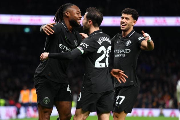 London, England, 1st February 2026. Antoine Semenyo (L) of Manchester City celebrates with Bernardo Silva (C) after scoring to make it 2-0 during the Tottenham Hotspur vs Manchester City Premier League match at the Tottenham Hotspur Stadium, London. Picture credit should read: Paul Terry Sportimage EDITORIAL USE ONLY. No use with unauthorised audio, video, data, fixture lists, club league logos or live services. Online in-match use limited to 120 images, no video emulation. No use in betting, games or single club league player publications. SPI_049_PT_Tottenham_Man_City SPI-4504-0049