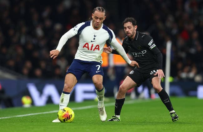 London, England, 1st February 2026. Xavi Simons of Tottenham Hotspur and Bernardo Silva of Manchester City challenge for the ball during the Tottenham Hotspur vs Manchester City Premier League match at the Tottenham Hotspur Stadium, London. Picture credit should read: Paul Terry Sportimage EDITORIAL USE ONLY. No use with unauthorised audio, video, data, fixture lists, club league logos or live services. Online in-match use limited to 120 images, no video emulation. No use in betting, games or single club league player publications. SPI_050_PT_Tottenham_Man_City SPI-4504-0050