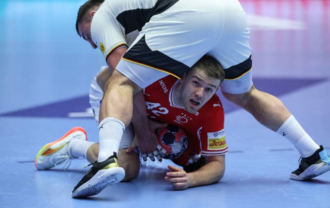 Denmark v Germany - Men s EHF EURO 2026 Final Jannik Kohlbacher of Germany and Thomas Arnoldsen of Denmark battles for the ball during the Men s EHF EURO 2026 Final match between Denmark and Germany at Jyske Bank Boxen on February 1, 2026 in Herning, Denmark.  SanjinxStrukic PIXSELL