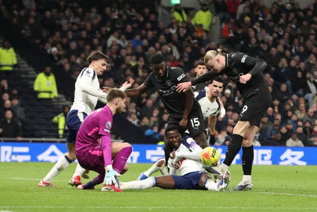 1st February 2026; Tottenham Hotspur Stadium, London, England; Premier League Football, Tottenham Hotspur versus Manchester City; Erling Haaland of Manchester City scoop shot deflects off Pape Matar Sarr of Tottenham Hotspur for a corner kick  KatiexChan Content restricted for UK based newspaper