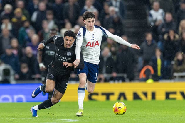 Tottenham Hotspur v Manchester City, Premier League Manchester City forward Omar Marmoush (7) and Tottenham Hotspur midfielder Archie Gray (14) battle for the ball during the Premier League match between Tottenham Hotspur and Manchester City at Tottenham Hotspur Stadium, London, UK on 1 February 2026. London Tottenham Hotspur Stadium London UK Editorial use only DataCo restrictions apply See www.football-dataco.com , Copyright: xToyinxOshodix PSI-23665-0062