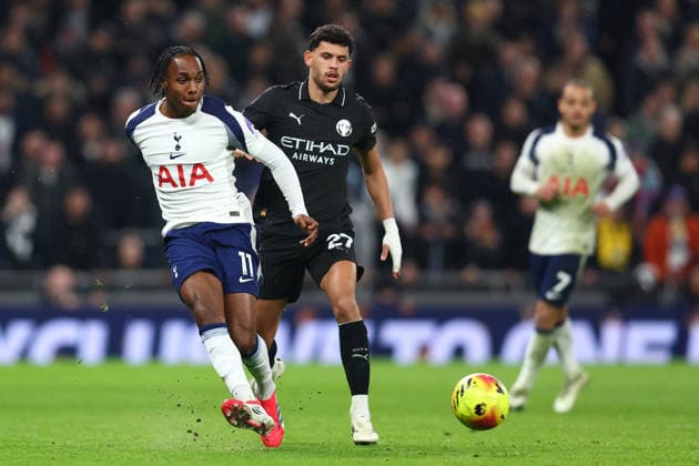 London, England, 1st February 2026. Mathys Tel of Tottenham Hotspur and Matheus Nunes of Manchester City challenge for the ball during the Tottenham Hotspur vs Manchester City Premier League match at the Tottenham Hotspur Stadium, London. Picture credit should read: Paul Terry Sportimage EDITORIAL USE ONLY. No use with unauthorised audio, video, data, fixture lists, club league logos or live services. Online in-match use limited to 120 images, no video emulation. No use in betting, games or single club league player publications. SPI_075_PT_Tottenham_Man_City SPI-4504-0075
