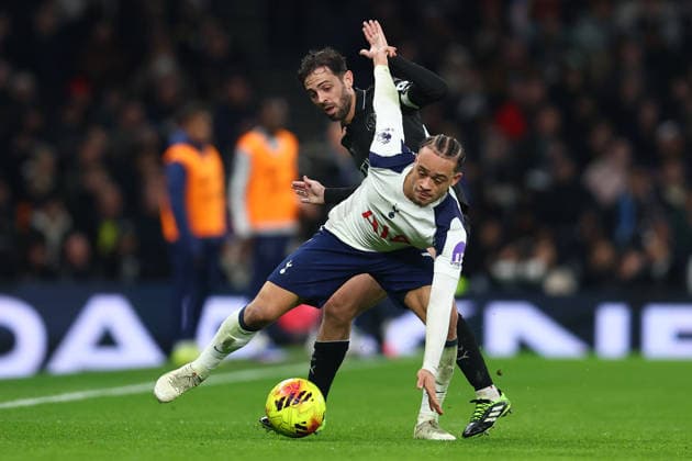 London, England, 1st February 2026. Xavi Simons of Tottenham Hotspur and Bernardo Silva of Manchester City challenge for the ball during the Tottenham Hotspur vs Manchester City Premier League match at the Tottenham Hotspur Stadium, London. Picture credit should read: Paul Terry Sportimage EDITORIAL USE ONLY. No use with unauthorised audio, video, data, fixture lists, club league logos or live services. Online in-match use limited to 120 images, no video emulation. No use in betting, games or single club league player publications. SPI_076_PT_Tottenham_Man_City SPI-4504-0076