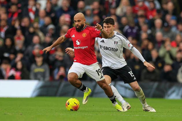 Manchester United, ManU v Fulham, Premier League Bryan Mbeumo (19) of Manchester United tries to get clear of Jorge Cuenca (15) of Fulham during the Premier League match between Manchester United and Fulham at Old Trafford, Manchester, UK on 1 February 2026. Manchester Old Trafford Greater Manchester UK Editorial use only DataCo restrictions apply See www.football-dataco.com , Copyright: xConorxMolloyx PSI-23668-0185