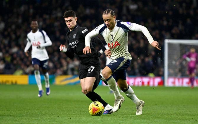 Tottenham Hotspur V Manchester City. Premier league. Xavi Simons (Spurs)and Phil Foden (Manchester City) during the Tottenham Hotspur V Manchester City Premier league match at the Tottenham Hotspur Stadium, London. Tottenham Tottenham Hotspur Stadium UK Copyright: xMartinxDaltonx Spurs_ManCity_010226_MD_068