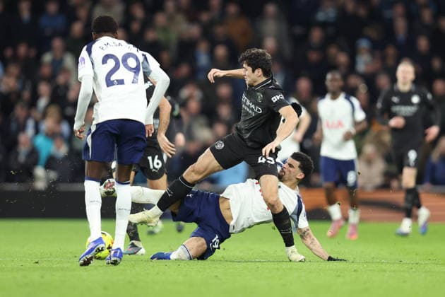 Tottenham v Man City 01 February 2026, London - Premier League Football - Tottenham Hotspur v Manchester City - Abdukodir Khusanov of Manchester City tackles Dominic Solanke of Tottenham Hotspur - Photo: Charlotte Wilson Offside. London UK Copyright: xCharlottexWilsonx xOffsidexOffside