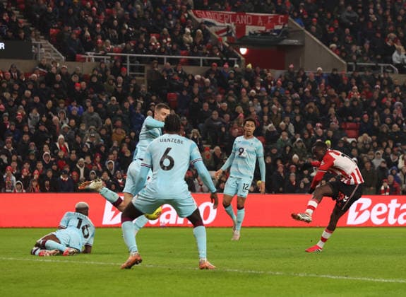 Sunderland, England, 2nd February 2026. Habib Diarra (R) of Sunderland shoots to score the second goal during the Sunderland vs Burnley Premier League match at the Stadium Of Light, Sunderland. Picture credit should read: Nigel Roddis Sportimage EDITORIAL USE ONLY. No use with unauthorised audio, video, data, fixture lists, club league logos or live services. Online in-match use limited to 120 images, no video emulation. No use in betting, games or single club league player publications. SPI_016_NR_SUND_BURN SPI-4506-0016
