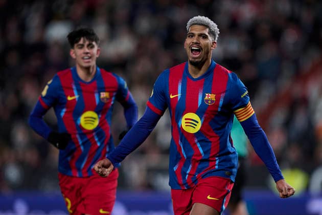 (260204) -- ALBACETE, Feb. 4, 2026 -- Ronald Araujo (R) of Barcelona celebrates during the Copa del Rey quarterfinal match between Albacete and Barcelona in Albacete, Spain, Feb. 3, 2026. (Str Xinhua) (SP)SPAIN-ALBACETE-FOOTBALL-COPA DEL REY-ALBACETE VS BARCELONA ChengxMin 
