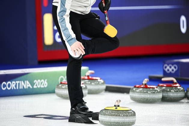 ITALY, CORTINA D AMPEZZO - FEBRUARY 4, 2026: A curler is in action in the Mixed Doubles Round Robin Session 1 curling event during the 2026 Winter Olympic Games, Olympische Spiele, Olympia, OS at the Cortina Curling Olympic Stadium. Mikhail Tereshchenko TASS  88208908