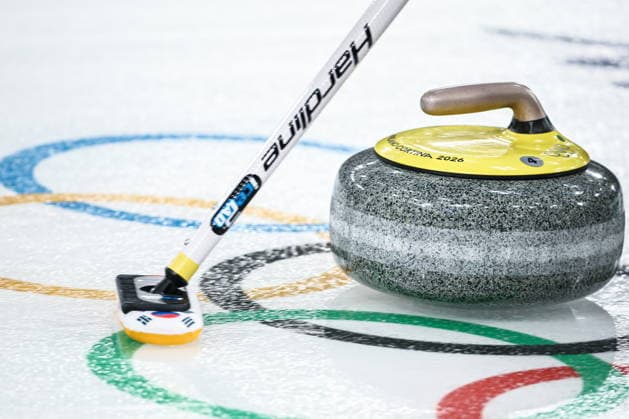 ITALY, CORTINA D AMPEZZO - FEBRUARY 4, 2026: A stone is pictured during the Mixed Doubles Round Robin Session 1 curling event at the 2026 Winter Olympic Games, Olympische Spiele, Olympia, OS at the Cortina Curling Olympic Stadium. Mikhail Tereshchenko TASS  88209317