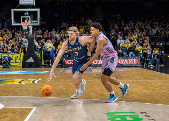 Basketball, Herren, Saison 2025 2026, Basketball Champions League (Round of 16, Gruppe J), Alba Berlin - Karditsa Iaponiki, v.l. Noah Horchler (Karditsa), Jack Kayil (Alba), 04.02.2026, Copyright: xSebastianxRäppold MatthiasxKochx