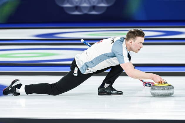 ITALY, CORTINA D AMPEZZO - FEBRUARY 4, 2026: Curler Magnus Nedregotten of Norway is in action in the Mixed Doubles Round Robin Session 1 curling event during the 2026 Winter Olympic Games, Olympische Spiele, Olympia, OS at the Cortina Curling Olympic Stadium. Mikhail Tereshchenko TASS  88210423