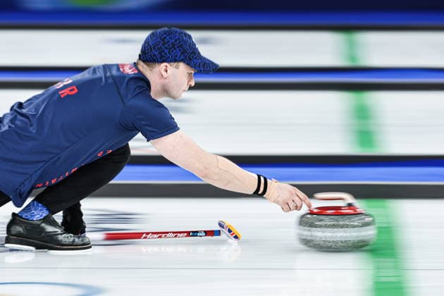 ITALY, CORTINA D AMPEZZO - FEBRUARY 4, 2026: Curler Bruce Mouat of Great Britain is in action in the Mixed Doubles Round Robin Session 1 curling event during the 2026 Winter Olympic Games, Olympische Spiele, Olympia, OS at the Cortina Curling Olympic Stadium. Mikhail Tereshchenko TASS  88210996