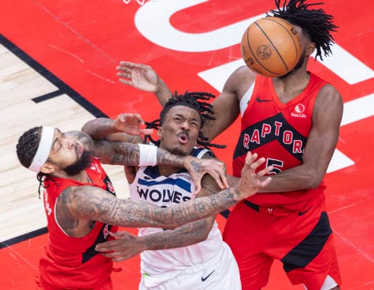 (260205) -- TORONTO, Feb. 5, 2026 -- Brandon Ingram (L) of Toronto Raptors vies with Bones Hyland (C) of Minnesota Timberwolves during the 2025-2026 NBA, Basketball Herren, USA regular season game between Toronto Raptors and Minnesota Timberwolves in Toronto, Canada, on Feb. 4, 2026. (Photo by Xinhua) (SP)CANADA-TORONTO-BASKETBALL-NBA-TIMBERWOLVES VS RAPTORS ZouxZheng 