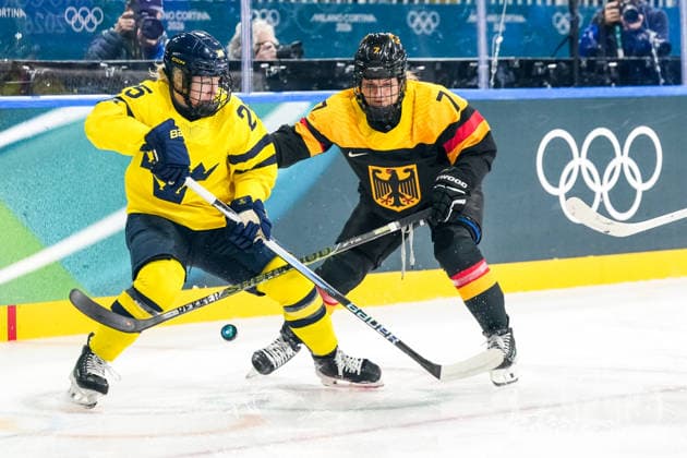 2026-02-05 - Milano Cortina 2026 Winter Olympics Women s Preliminary Round - Group B MILAN, ITALY - FEBRUARY 5: Lina Ljungblom of Sweden, Franziska Feldmeier of Germany during the Milano Cortina 2026 Winter Olympics Women s Preliminary Round - Group B match between Sweden and Germany at the Milano Rho Ice hockey, Eishockey Arena on February 5, 2026 in Milan, Italy Milan Milano Rho Ice Hockey Arena Italy Content not available for redistribution in The Netherlands directly or indirectly through any third parties. Copyright: xAndrexWeeningx